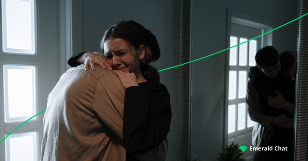 image of a female hugging a male, crying